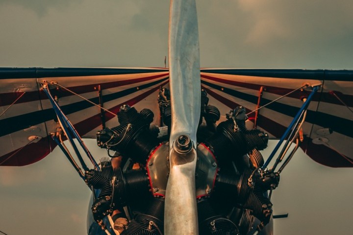 a small airplane hanging from the ceiling